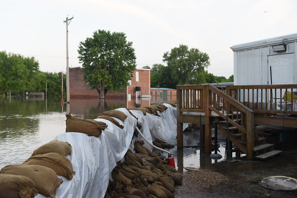 Concrete walls with sandbags on both sides were built to protect Mokane